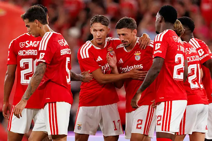 Benfica's players celebrate a goal against St. Gallen in the Europa League.