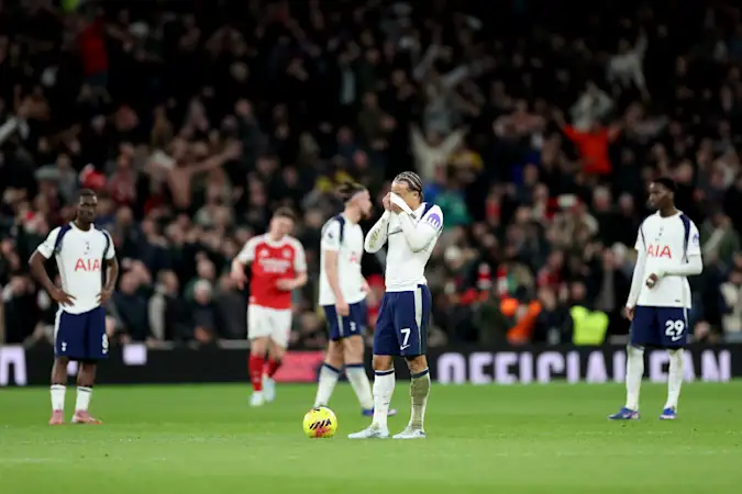 Xavi Simons of Tottenham Hotspur looks dejected after Eberechi Eze of Arsenal (not pictured) scores his team's third goal during the Premier League match between Tottenham Hotspur and Arsenal at Tottenham Hotspur Stadium