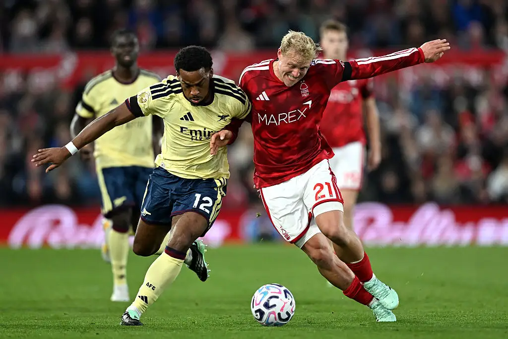 Jurrien Timber of Arsenal and Xaver Schlager of Nottingham Forest compete for the ball during the Premier League 2026/27 match between Nottingham Forest FC and Arsenal FC at City Ground on October 18, 2026 in Nottingham, England