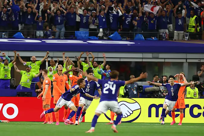 Japan celebrate a late leveller against the Netherlands